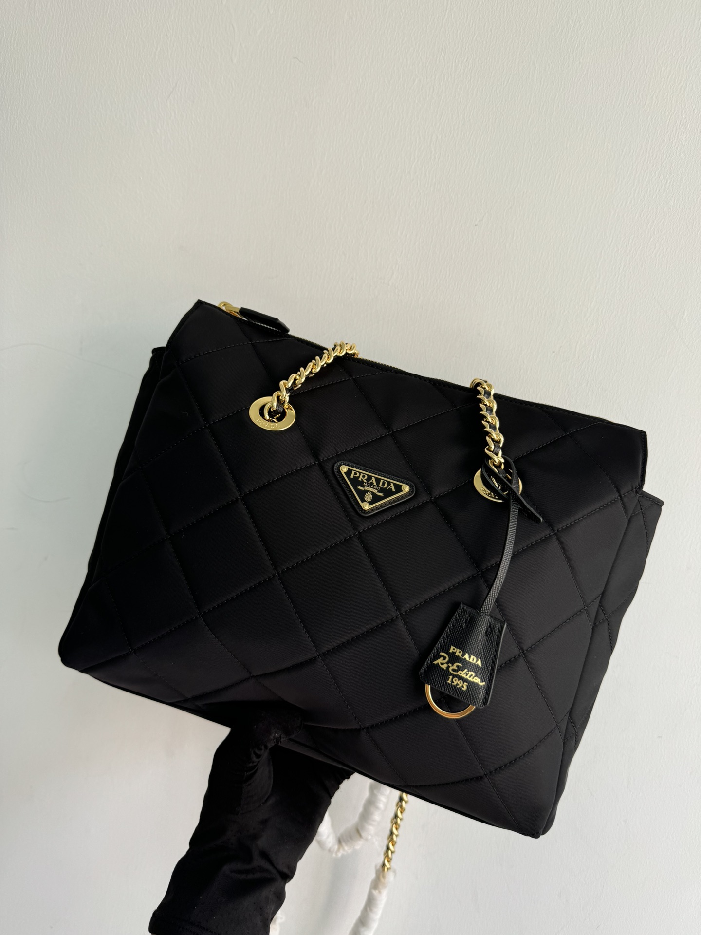 Pre-Owned Prada Enamel Triangle Logo Quilted Leather Handbag - Black with Silver Hardware