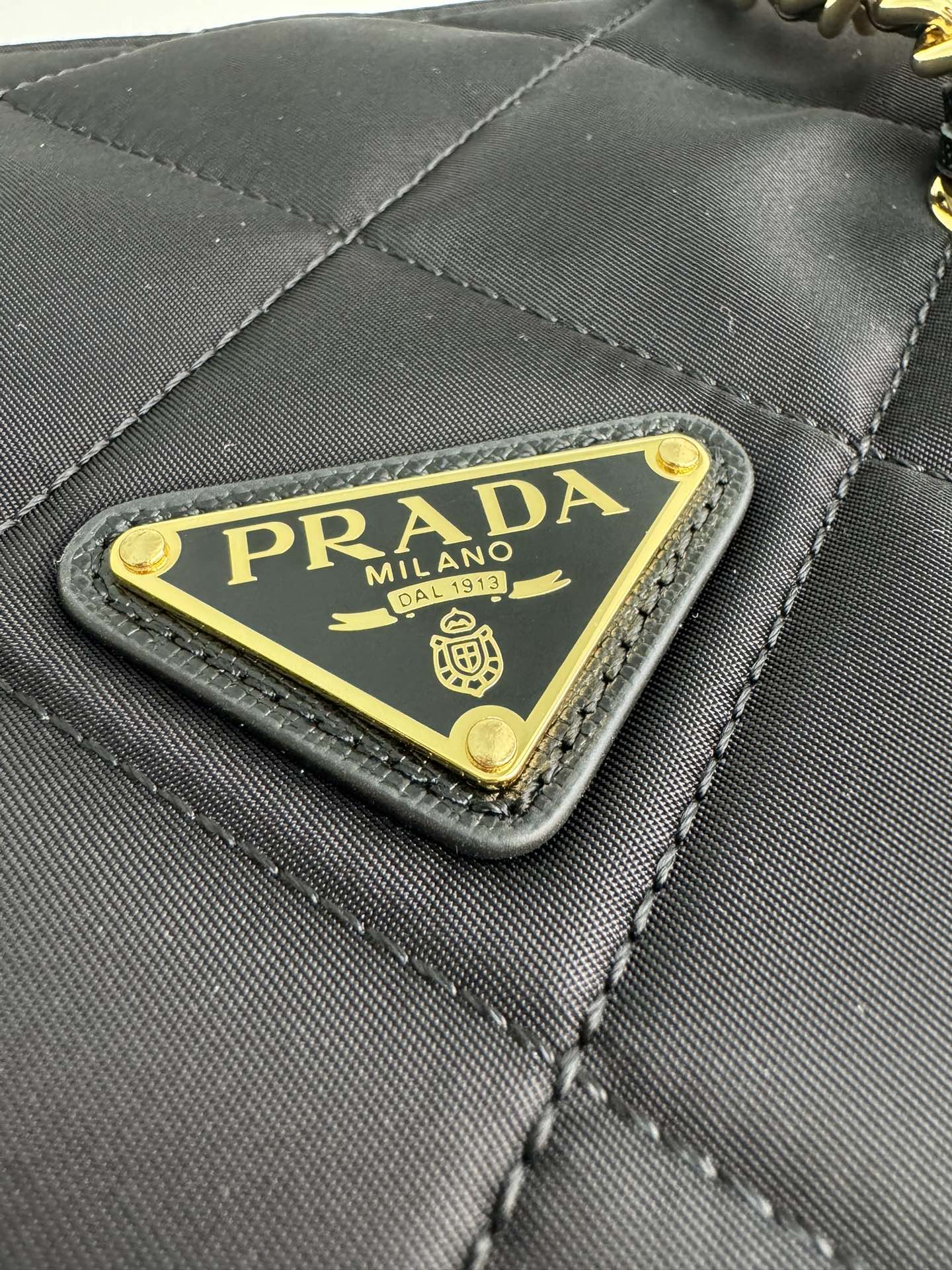 Pre-Owned Prada Enamel Triangle Logo Quilted Leather Handbag - Black with Silver Hardware