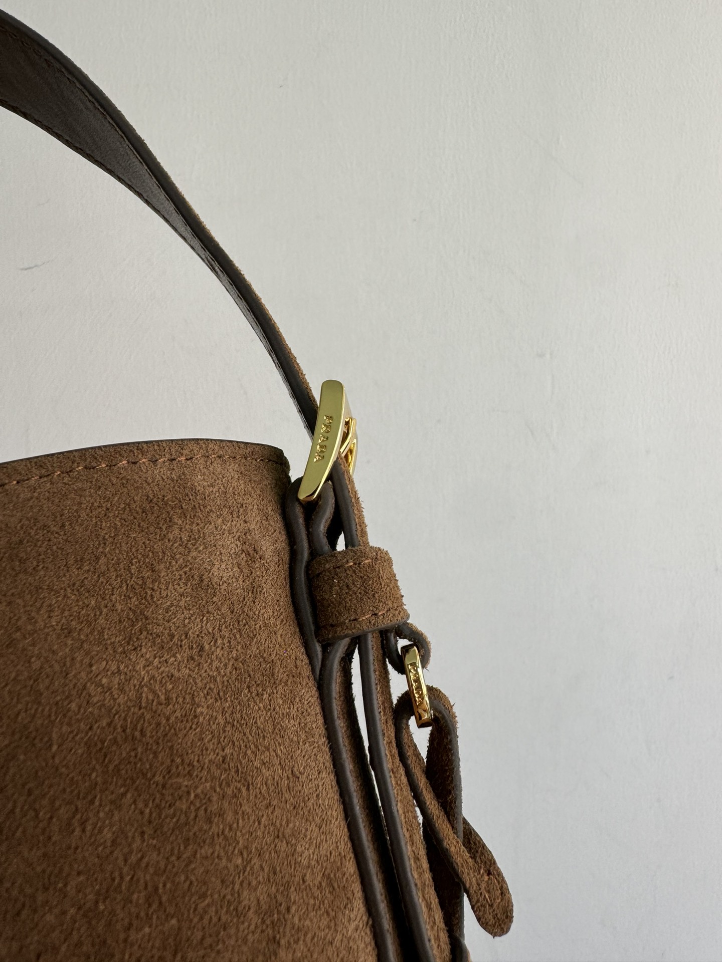 Pre-Owned Prada Suede Mini Bucket Bag - Cinnamon with Enameled Triangle Logo