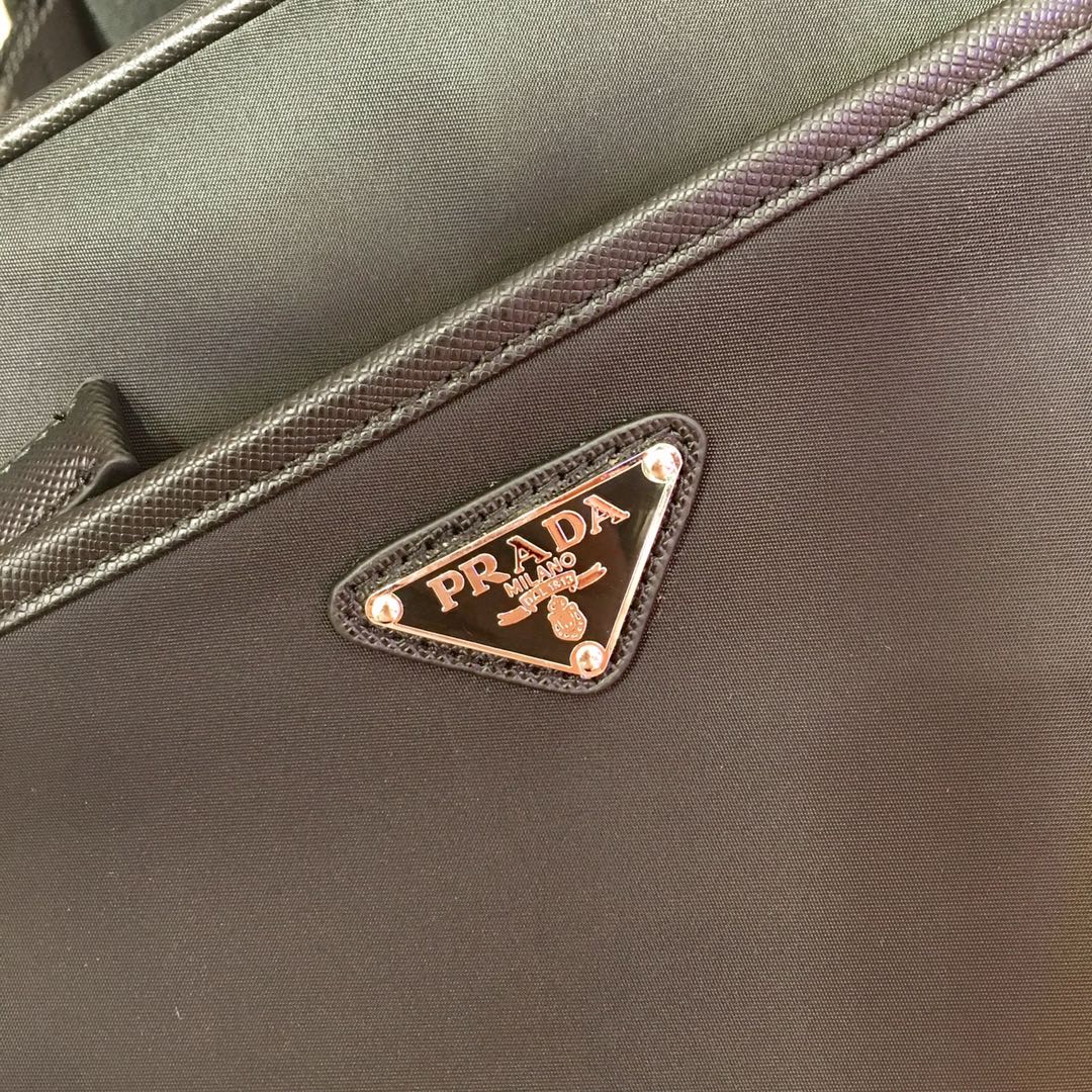 Pre-Owned Prada Suede Mini Bucket Bag - Cinnamon with Enameled Triangle Logo