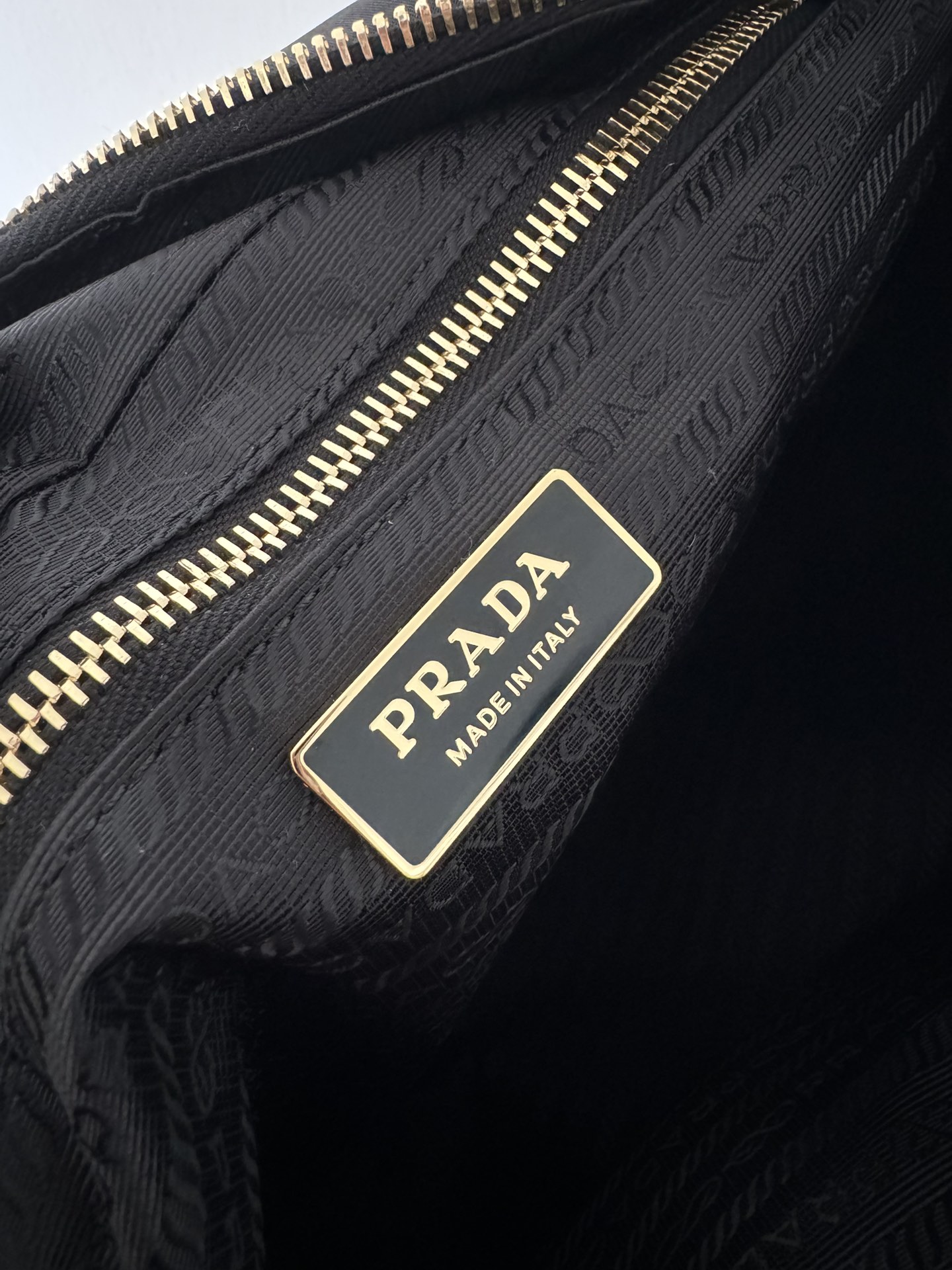 Pre-Owned Prada Enamel Triangle Logo Quilted Leather Handbag - Black with Silver Hardware